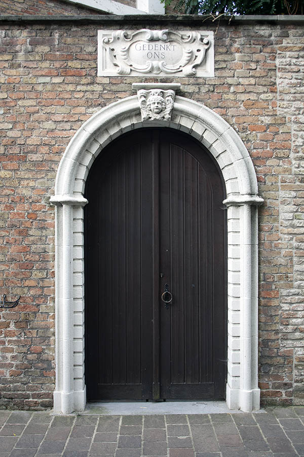 Photo 00191: Black, formed double door with white pilaster