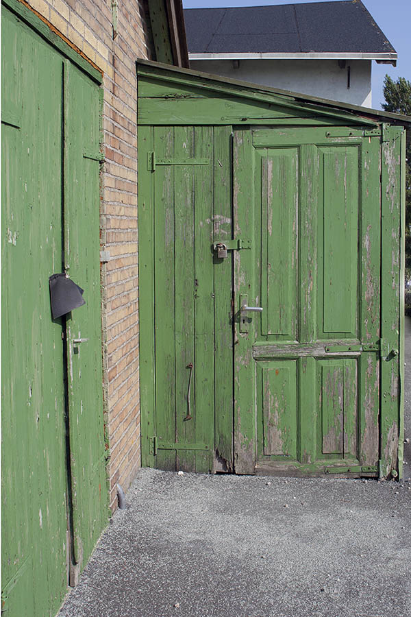Photo 00375: Worn, green gate and door