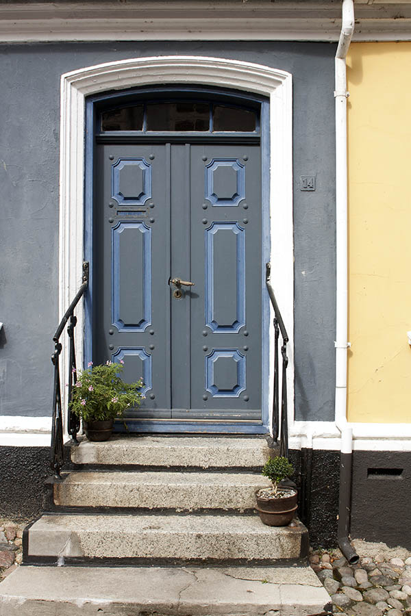 Photo 00470: Panelled, teal double door with blue details and fan light