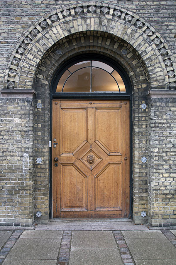 Photo 01384: Carved, oiled door with fan light