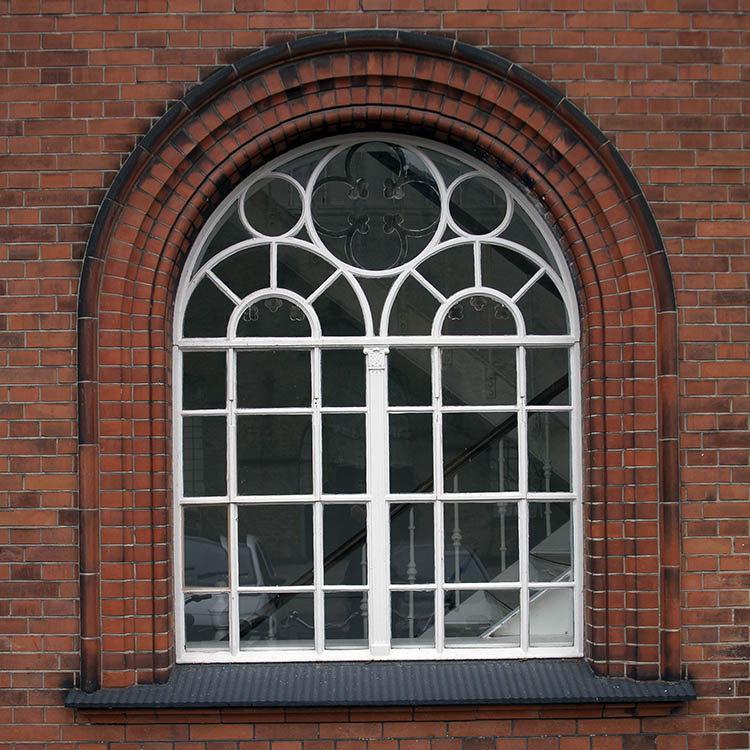 Photo 01397: Large, white, formed window with 44 panes