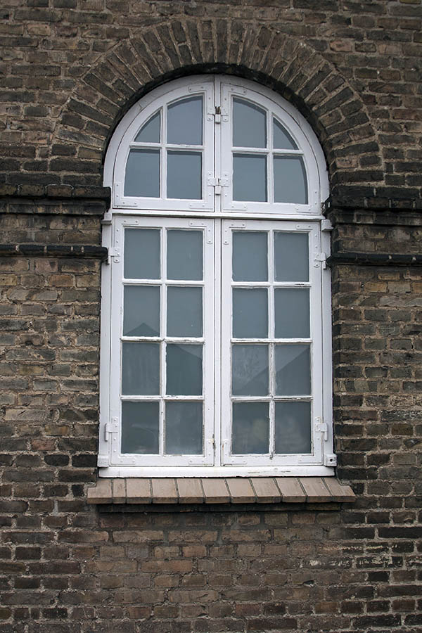 Photo 01416: Formed, white window with four frames and 24 panes