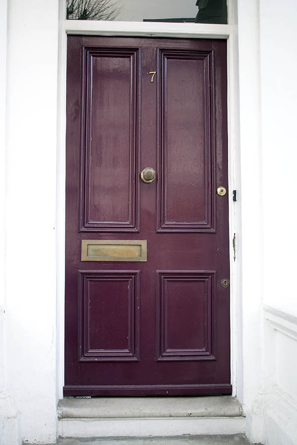 Photo 01524: Panelled, purple door with top window