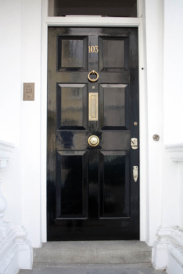 Photo 01527: Panelled, shiny black door with top window