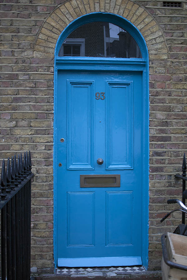 Photo 01677: Panelled, blue door with fan light