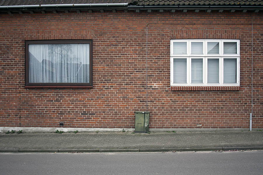 Photo 02120: Two different windows. Black window with one pane and white window with eight frames.