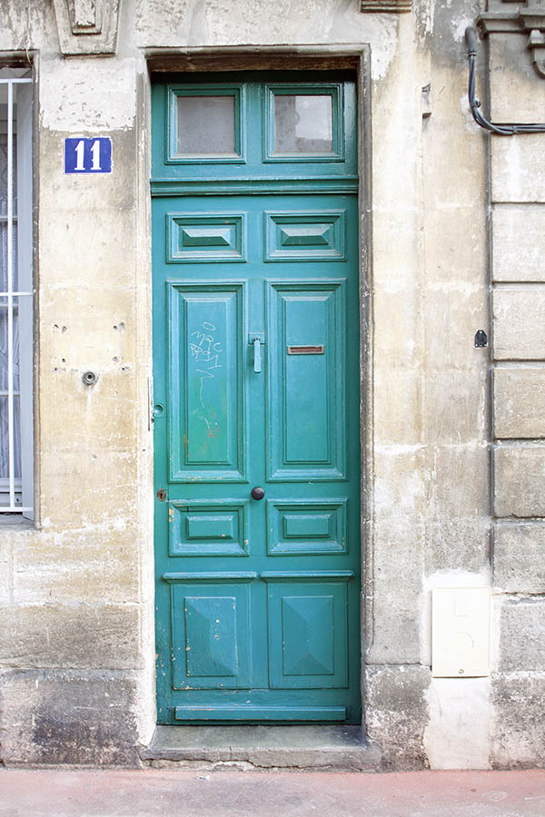 Photo 02164: Worn, panelled, light blue door with top windows