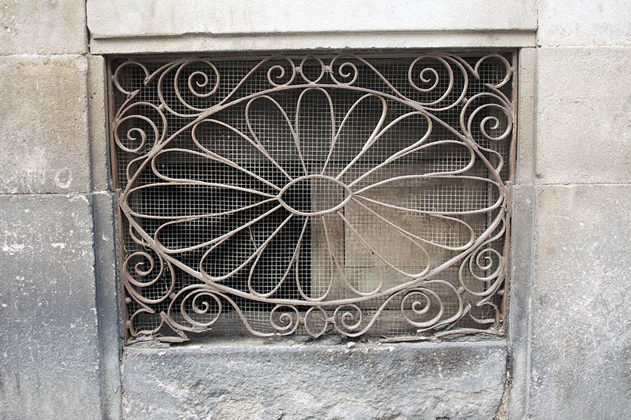 Photo 02380: Rusty, brown window with lattice