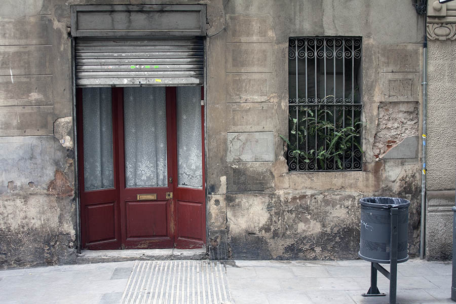 Photo 02462: Panelled, red door with security shutter and latticed window