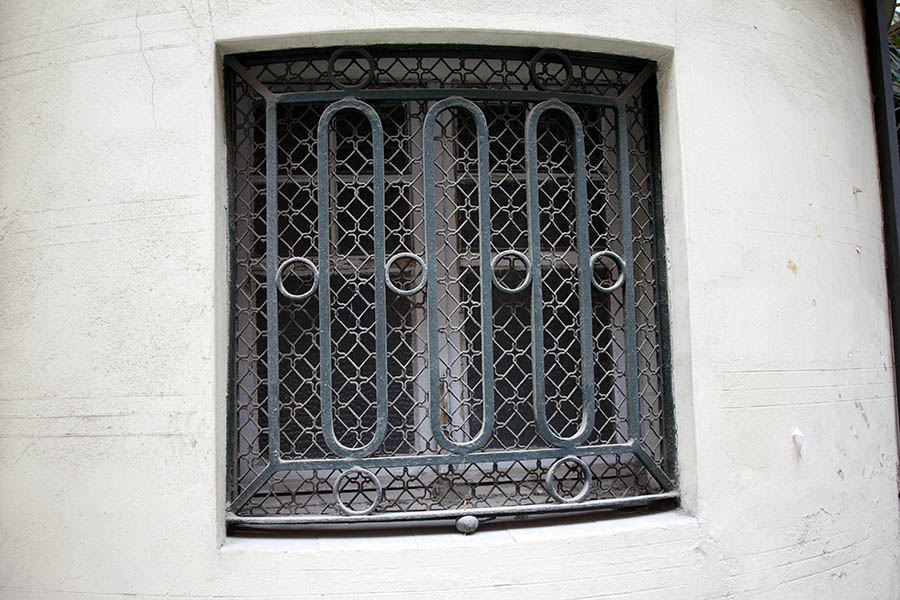 Photo 02467: White, latticed window with two frames