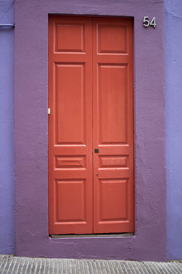 Photo 02490: Panelled, red double door