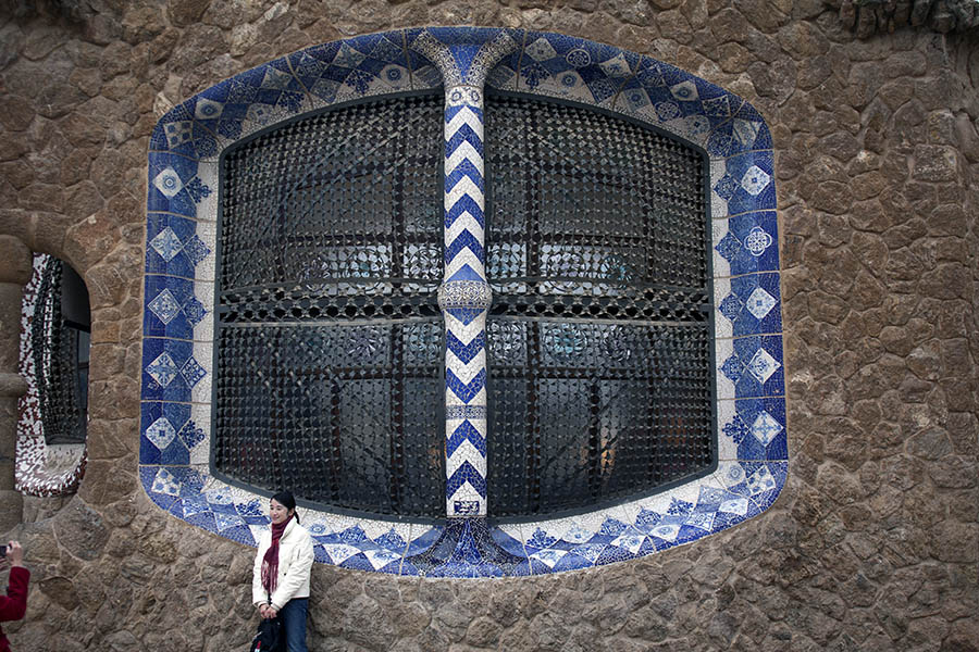 Photo 02500: Large, formed window with lattice and white and blue mosaic work