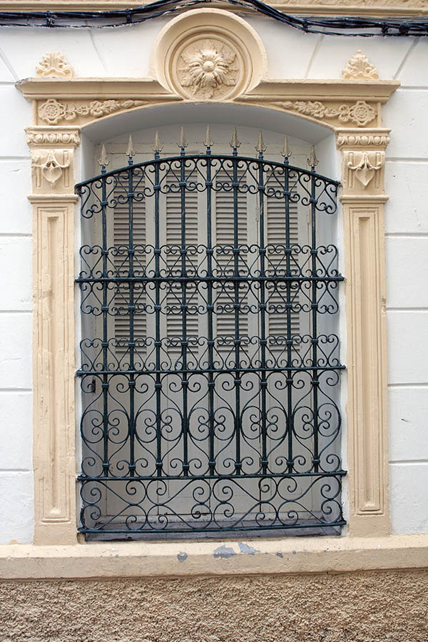 Photo 02702: Shuttered, latticed, formed, white window
