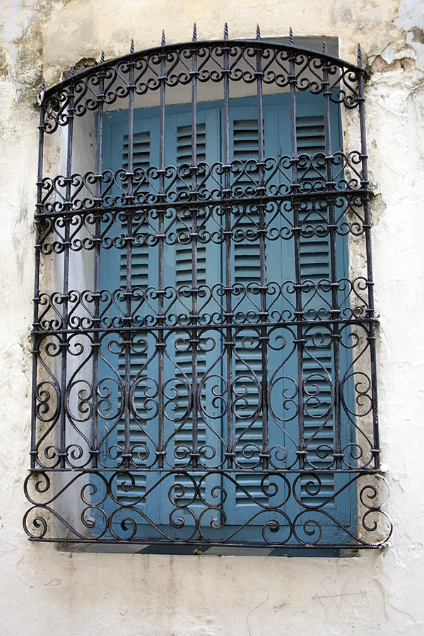 Photo 02704: Latticed, formed window with light blue shutters