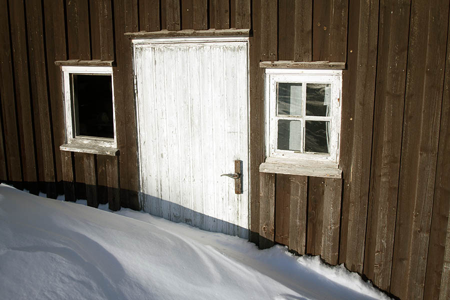 Photo 03418: White cottage door and windows blocked by snow