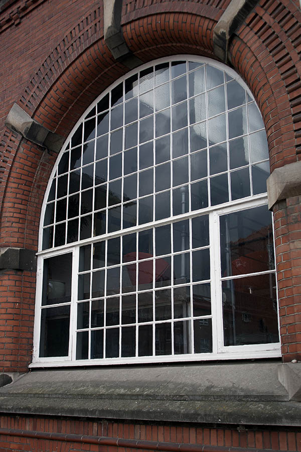 Photo 04018: Large, formed, white window with 114 panes