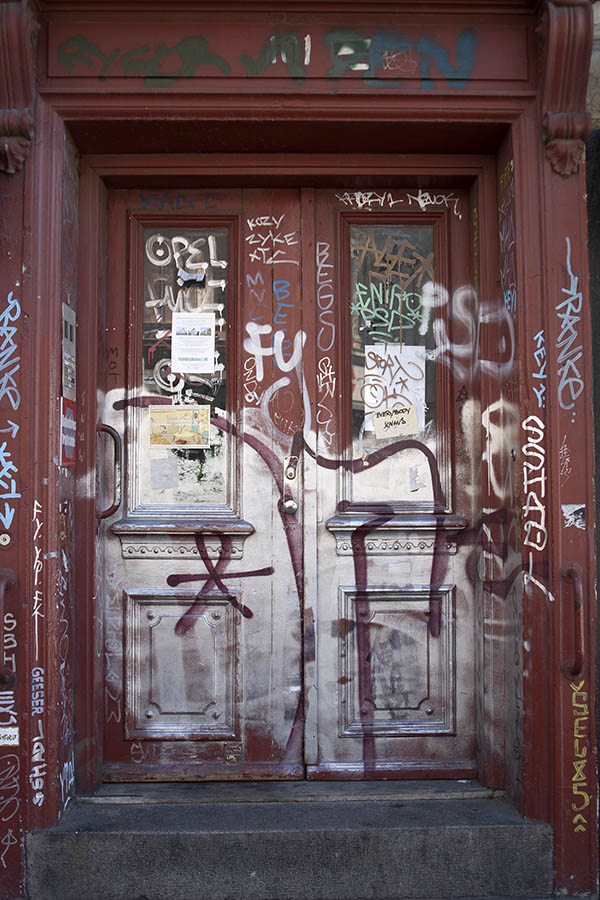 Photo 04113: Panelled, carved, red double door