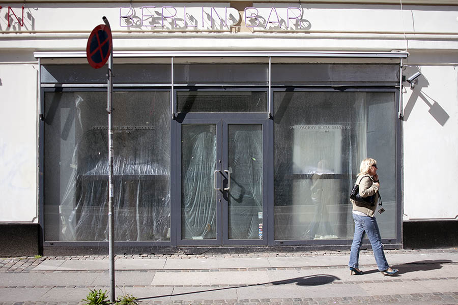 Photo 04128: Grey aluminium double door and windows in a closed shop facade