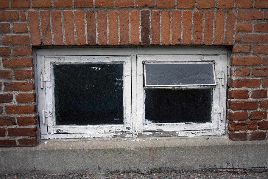 Photo 04395: Decayed, white cellar window with two frames and three panes