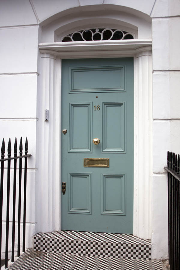 Photo 04608: Panelled, teal door with decorated fan light