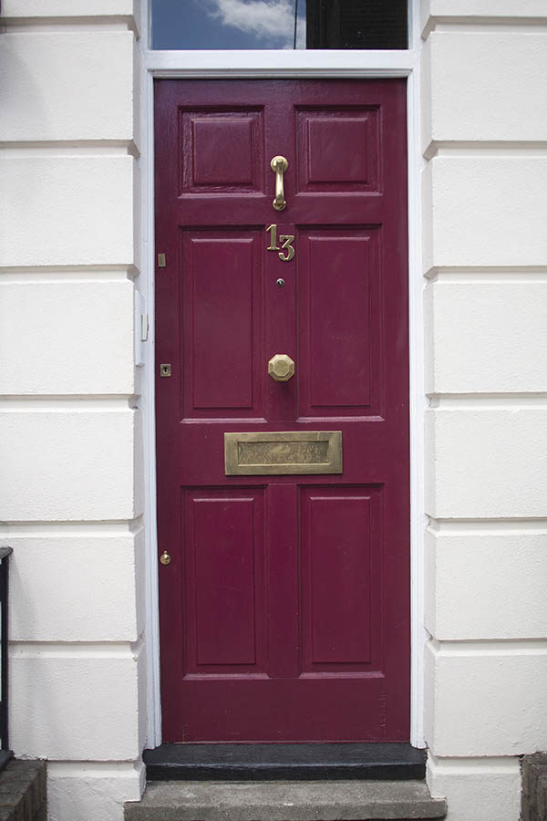 Photo 04623: Panelled, purple door with top window