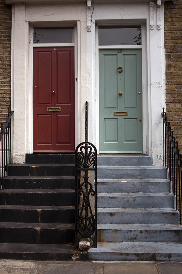 Photo 05010: Two red and light green panelled doors with top windows