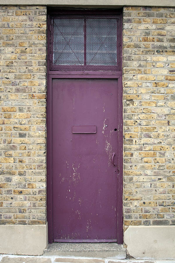 Photo 05210: Worn, purple door with top window