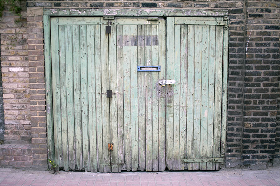 Photo 05615: Worn, light green gate made of planks