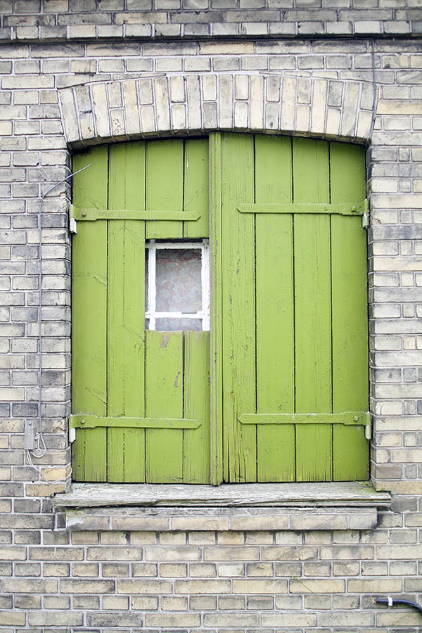 Photo 06181: Light green shutters covering a white window