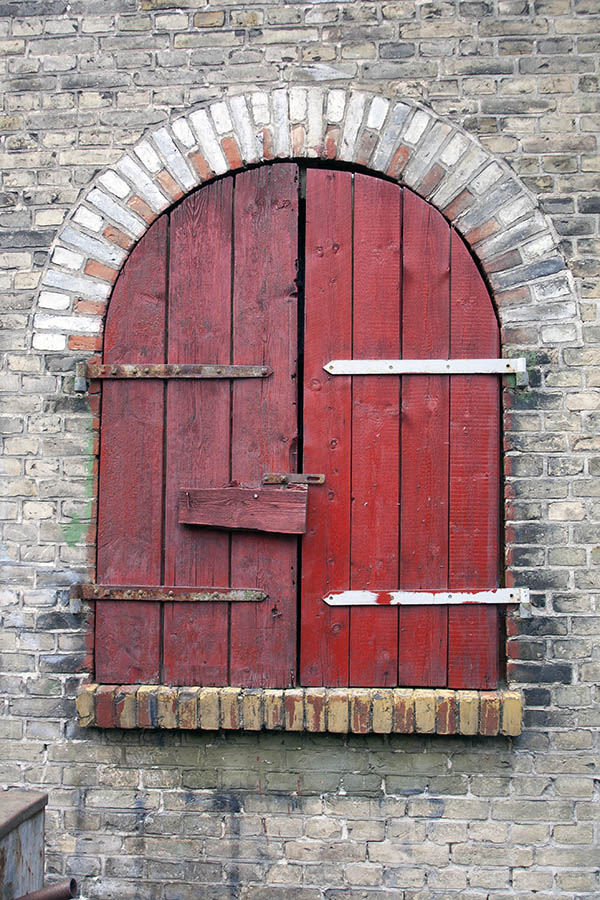 Photo 06291: Worn, formed, red double trapdoor