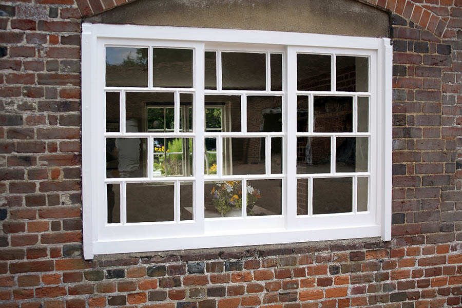 Photo 06501: White sliding window with three frames and 30 panes
