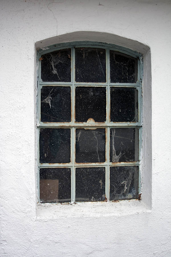 Photo 06931: Formed, grey metal stable window