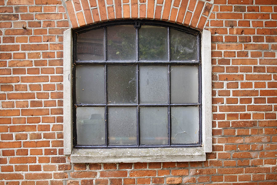Photo 07148: Formed, black metal window in stable style