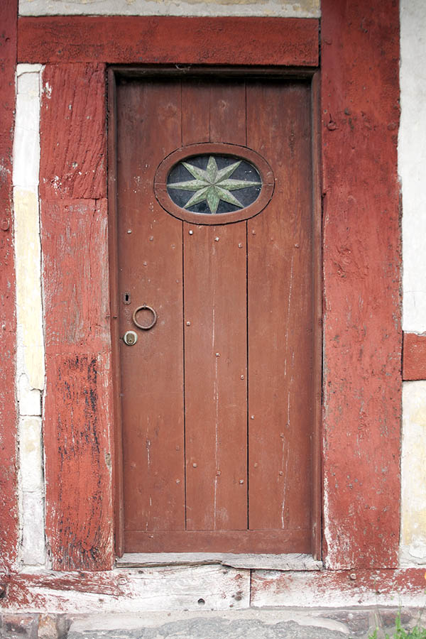 Photo 07252: Worn, red door made of planks