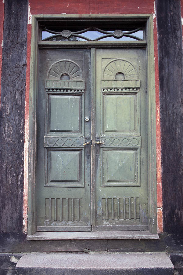 Photo 07646: Panelled, carved, green double door with top window