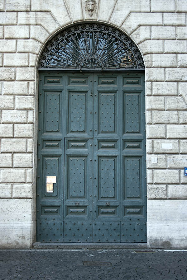 Photo 08082: Panelled, teal gate with latticed fan light and minor door