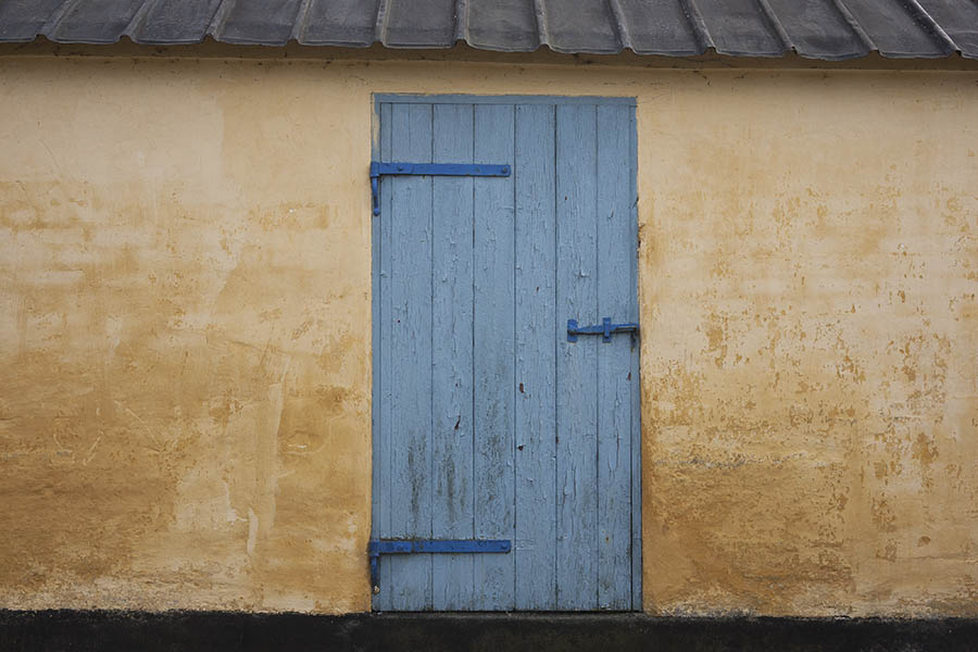 Photo 08471: Worn, light blue door made of planks