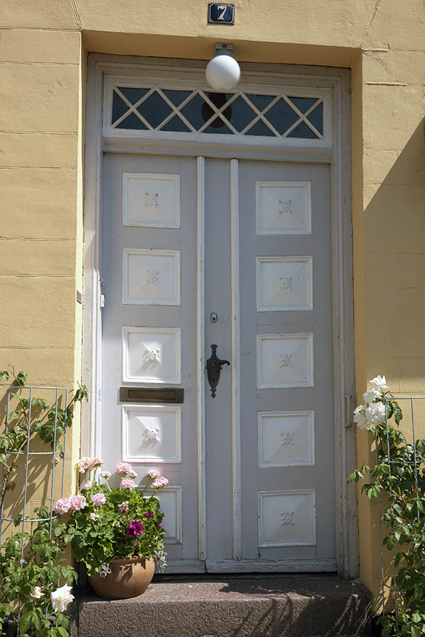 Photo 08663: Carved, panelled, grey and white double door with top window