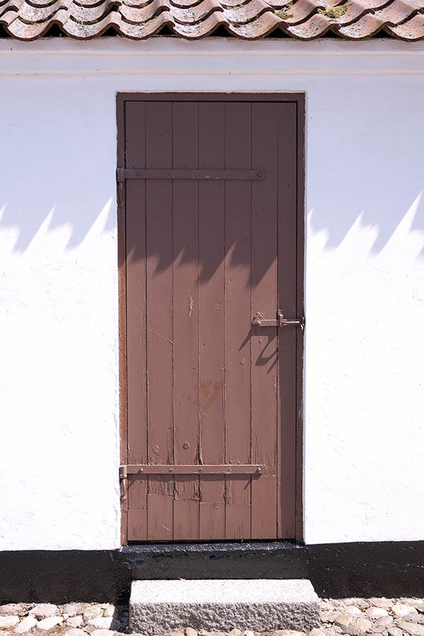 Photo 08674: Worn, brown door made of planks