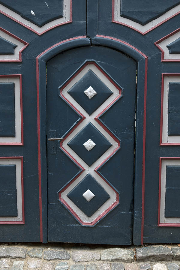Photo 08830: Formed, teal, white and red door in a gate
