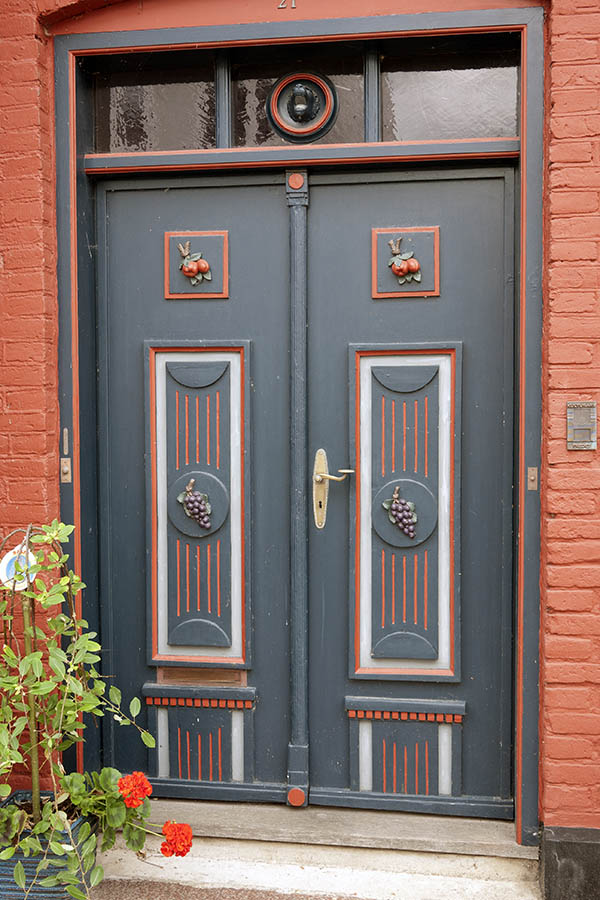 Photo 08867: Carved, panelled, blue, red and grey double door with top window
