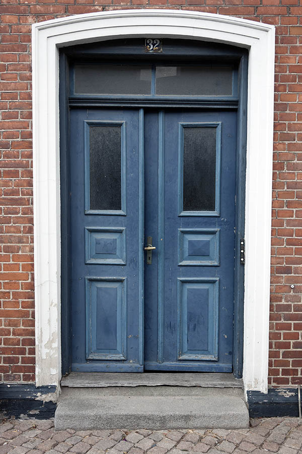 Photo 08893: Worn, panelled, blue and light blue double door with top window