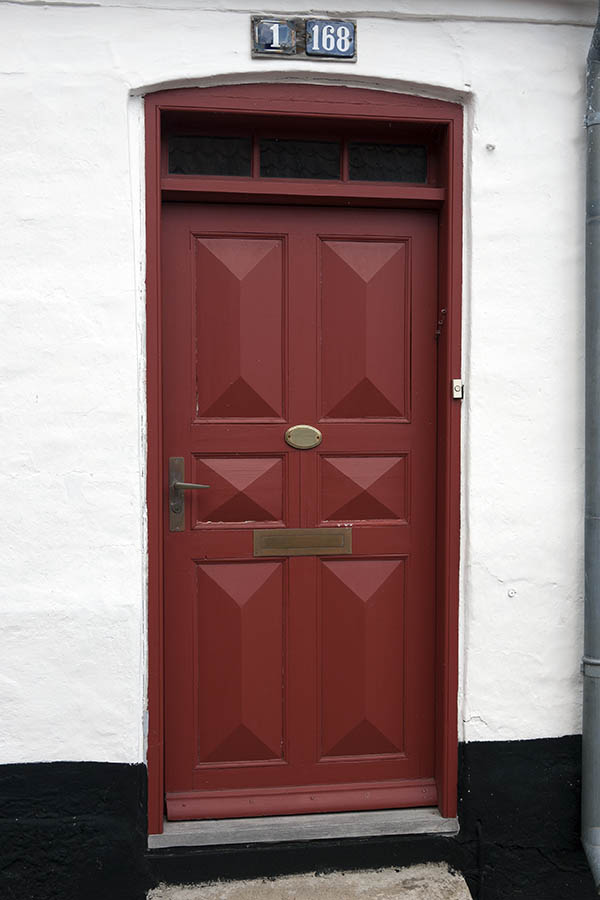 Photo 08903: Panelled, red door with top window