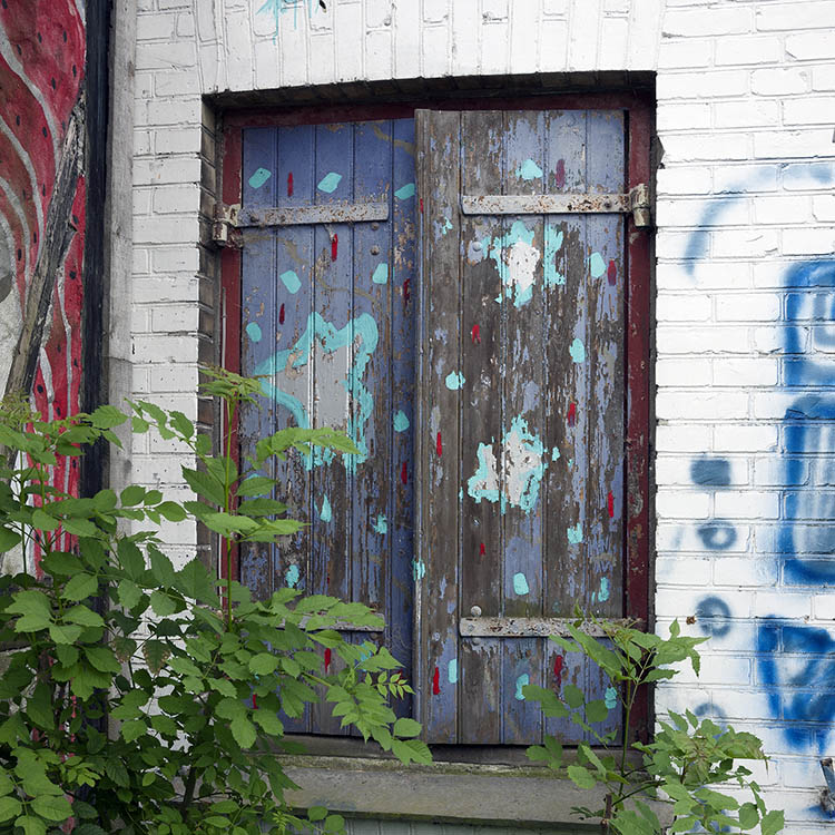 Photo 09086: Purple shutters with turquoise, white, and red decoration