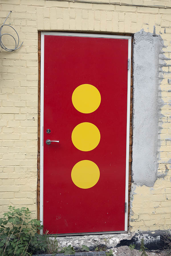 Photo 09102: Red plate door with three yellow circles