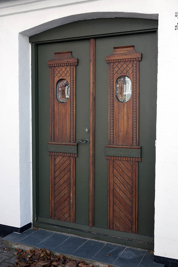 Photo 09333: Carved, panelled, green and lacquered double door with door lights