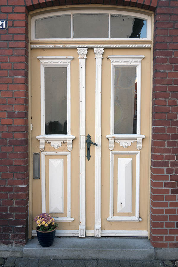 Photo 09338: Carved, panelled, light yellow and white door with fan light and door lights