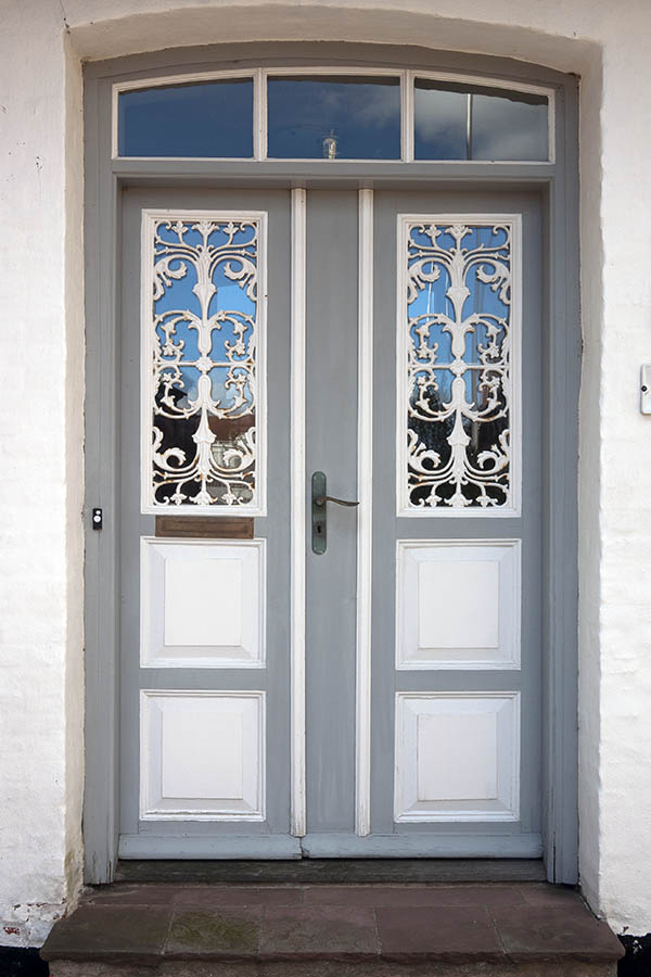Photo 09365: Panelled, grey and white double door with fan light