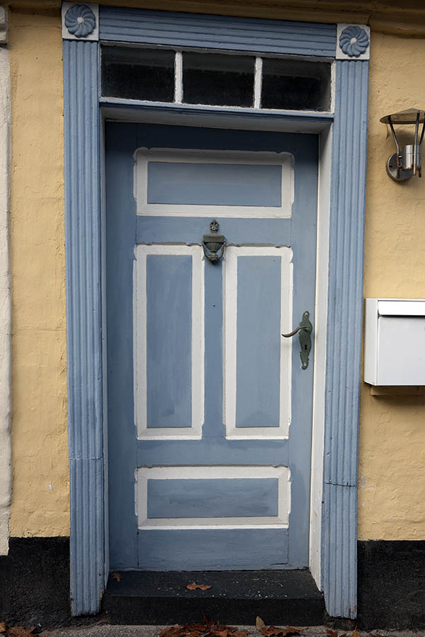 Photo 09440: Lopsided, panelled, light blue and white door with top window