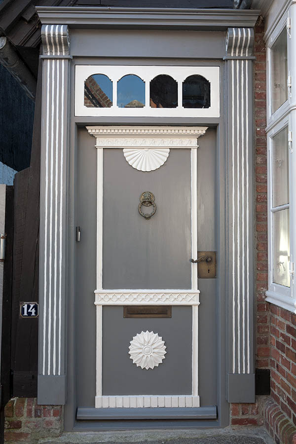 Photo 09567: Carved, grey and white door with top window